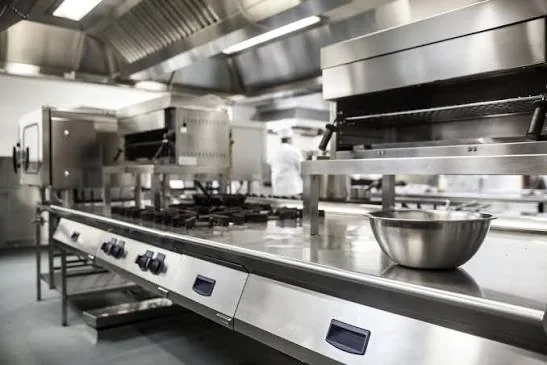 Stainless steel professional galley with cooking ranges